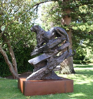 s320 leopard lying on rocks life size